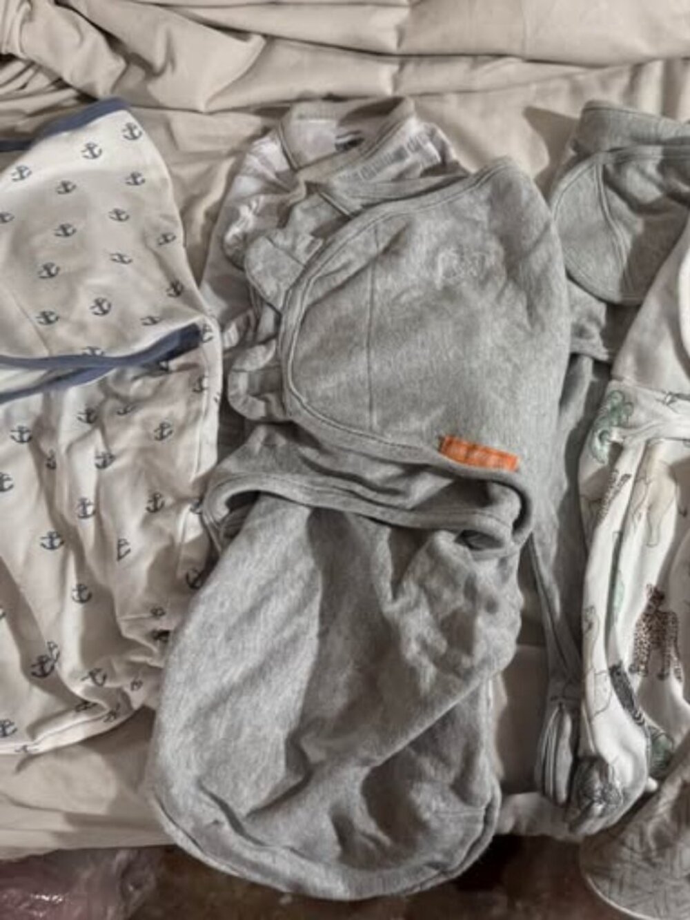 6 infant swaddles- (1) amazing baby (0-3), (2) swaddles me small-medium, (3) Aid
